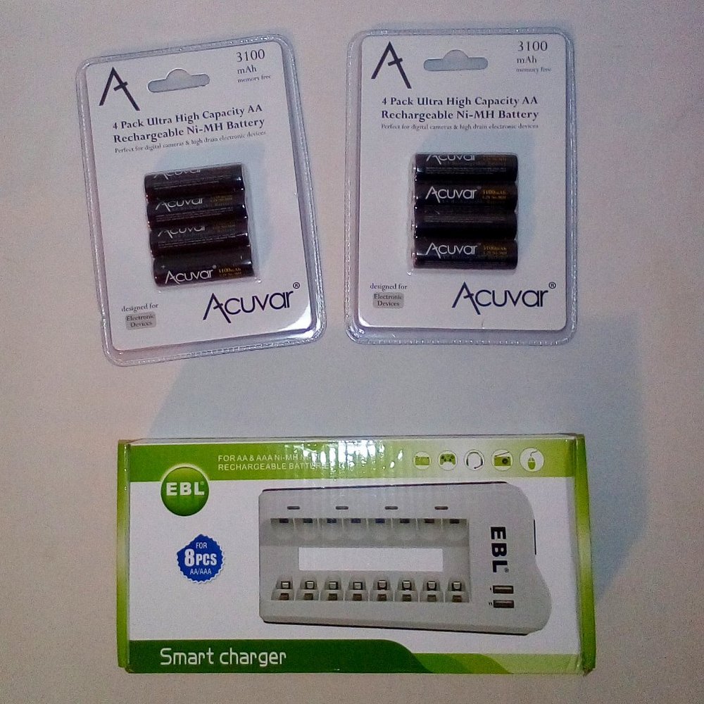 AA Battery - Rechargeable: (8)  3100 mAh Ni-MH Batteries.  Smart Charger. New